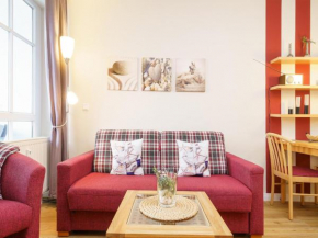 Apartment in a lakeside park in Sellin with a balcony